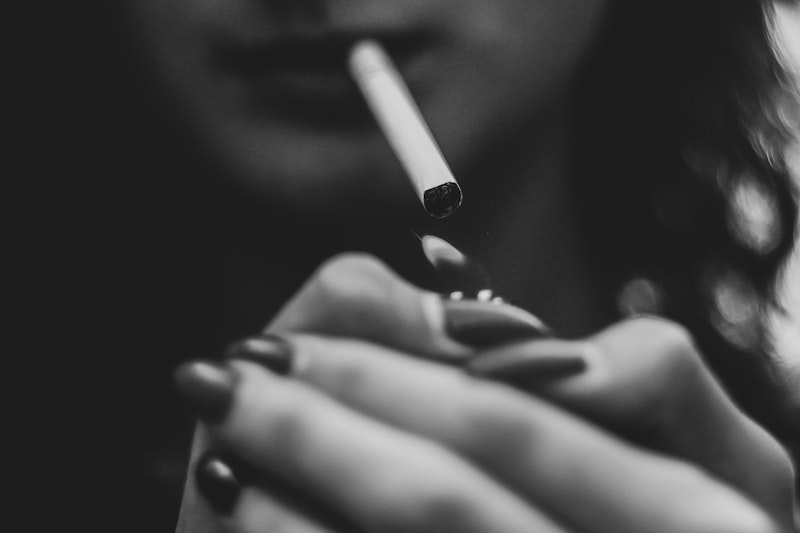 black and white woman smoking
